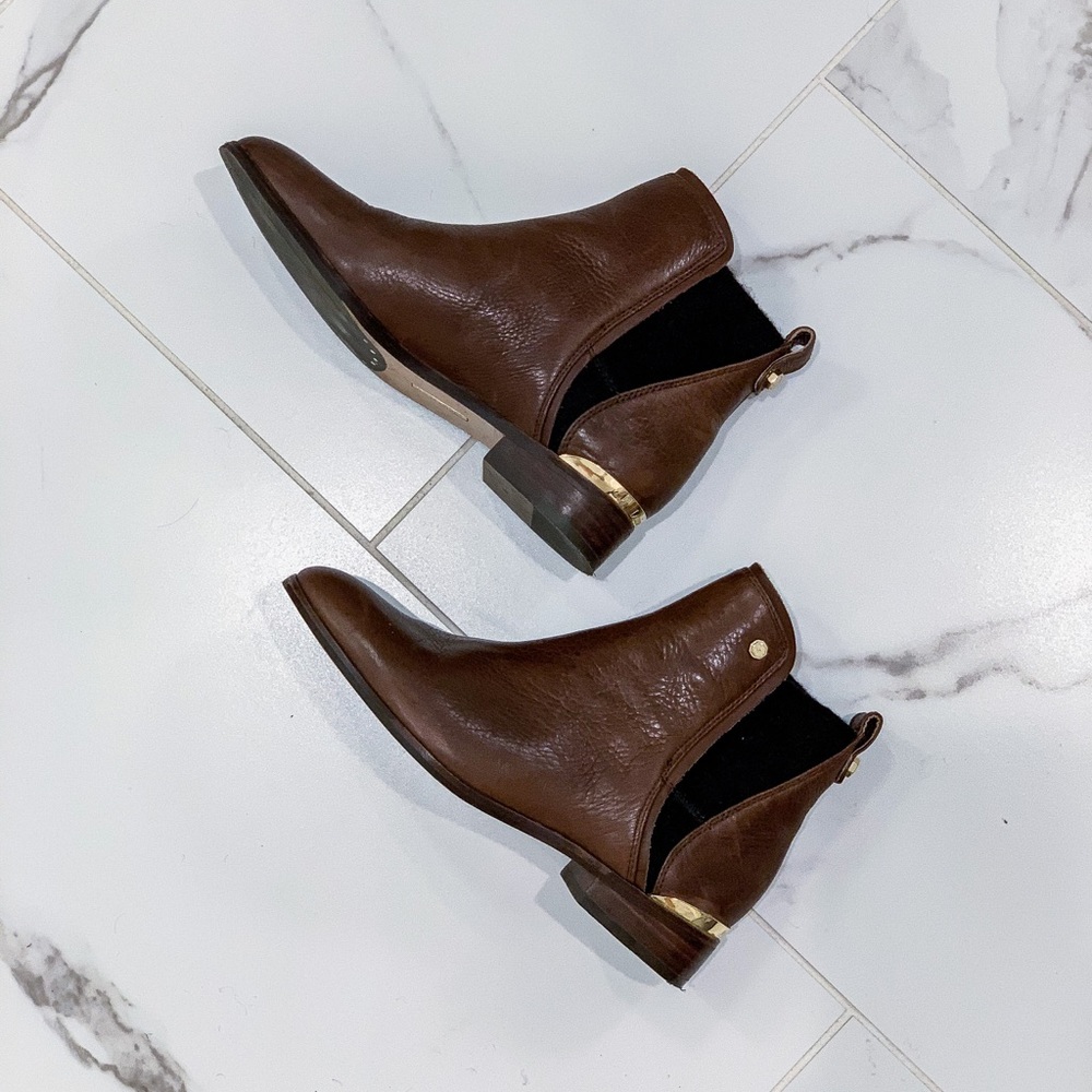 Brown leather booties.